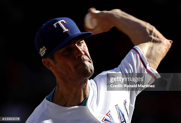 Cole Hamels of the Texas Rangers throws a pitch against the Toronto Blue Jays during game one of the American League Divison Series at Globe Life...