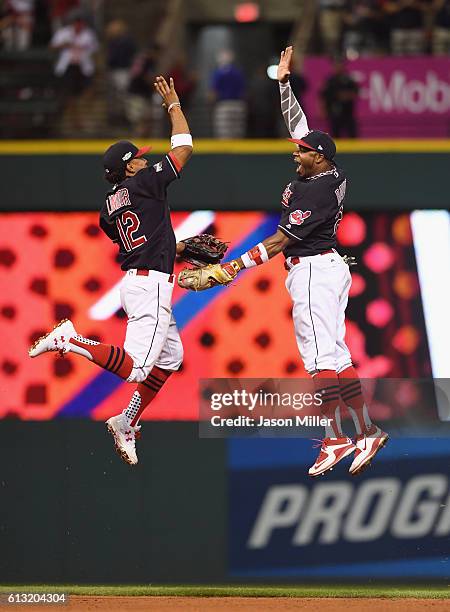 Francisco Lindor of the Cleveland Indians and Rajai Davis celebrate after defeating the Boston Red Sox 6-0 in game two of the American League Divison...