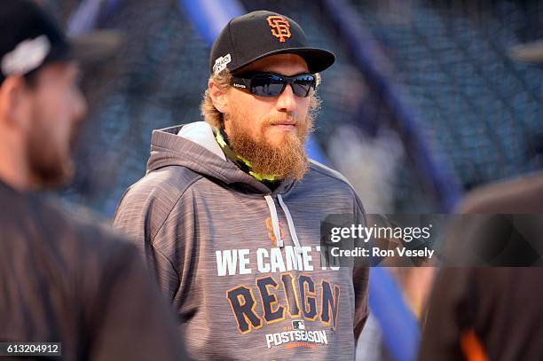 Hunter Pence of the San Francisco Giants looks on during batting practice prior to Game 1 of NLDS against the Chicago Cubs at Wrigley Field on...