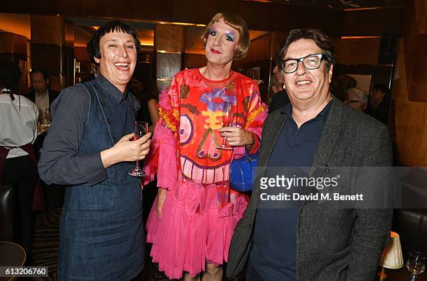 Cornelia Parker, Grayson Perry and Mark Wallinger attend the Frieze Magazine 25th anniversary dinner at Brasserie Zedel on October 7, 2016 in London,...