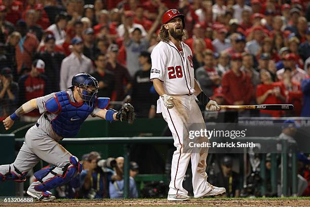 Jayson Werth of the Washington Nationals reacts after striking out for the final out of the ninth inning to be defeated by the Los Angeles Dodgers...