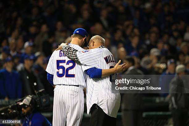 Chicago Cubs relief pitcher Justin Grimm and Billy Williams before Game 1 of the National League Division Series against the San Francisco Giants at...