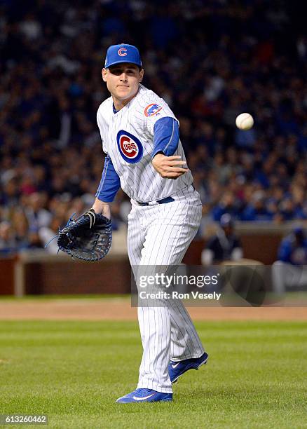 Anthony Rizzo of the Chicago Cubs flips the ball to first base during Game 1 of NLDS against the San Francisco Giants at Wrigley Field on Friday,...
