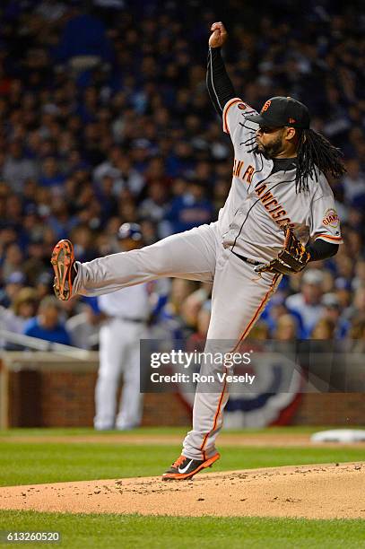 Johnny Cueto of the San Francisco Giants pitches in the first inning during Game 1 of NLDS against the Chicago Cubs at Wrigley Field on Friday,...
