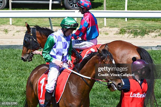 Michelle Payne riding Dandy Gent waiting at the barrier start beside John Allen riding Prince of Penzance in Race 2, Herbert Power Stakes during...