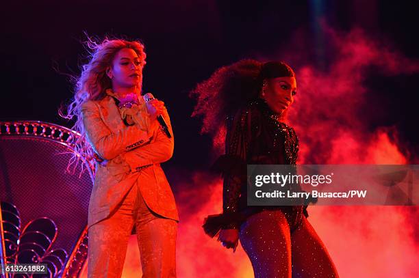Entertainer Beyonce and tennis player Serena Williams perform on stage during closing night of "The Formation World Tour" at MetLife Stadium on...