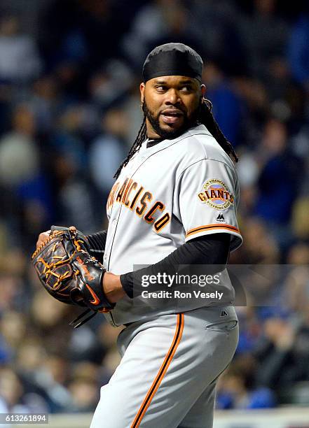 Johnny Cueto of the San Francisco Giants reacts after getting the final out of the fourth inning during Game 1 of NLDS against the Chicago Cubs at...