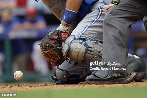 The glove of Russell Martin of the Toronto Blue Jays in game two of the American League Division Series at Globe Life Park in Arlington on October 7,...