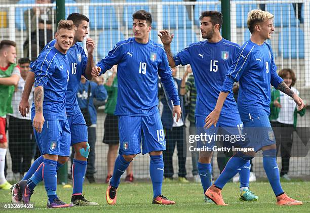 Federico Dimarco of Italy celebrates with team mates after scoring his team second goal during the Four Nations Tourmament match between Italy U20...