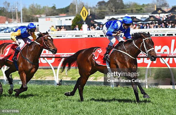 Hugh Bowman riding Winx defeats Brad Rawiller riding Black Heart Bart and Craig Williams riding He or She in Race 6, Ladbrokes Caulfield Stakes...