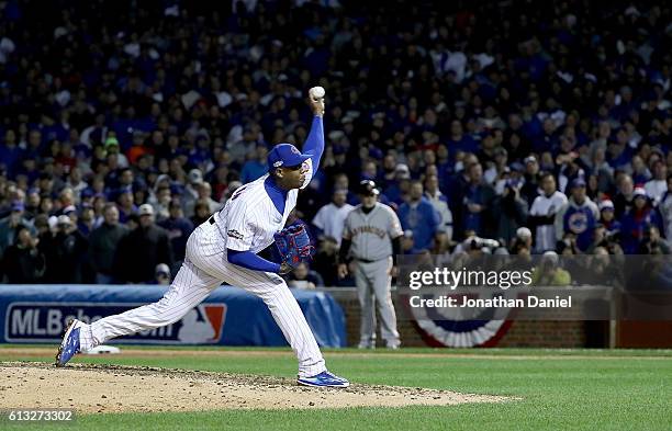 Aroldis Chapman of the Chicago Cubs pitches in the ninth inning against the San Francisco Giants at Wrigley Field on October 7, 2016 in Chicago,...