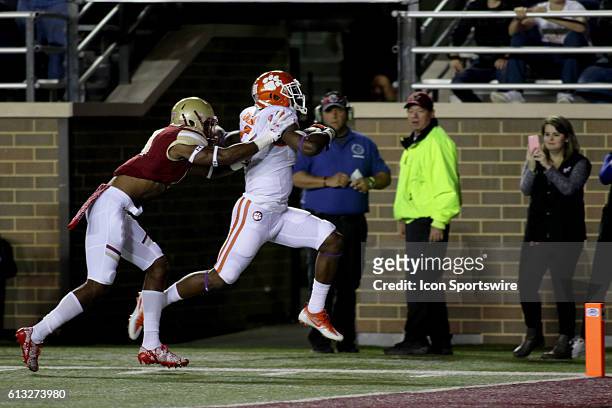 Brandon Barlow of BC pursues Brian Dawkins Jr. Of Clemson during the Clemson Tigers and Boston College Eagles game at Alumni Stadium in Chestnut...