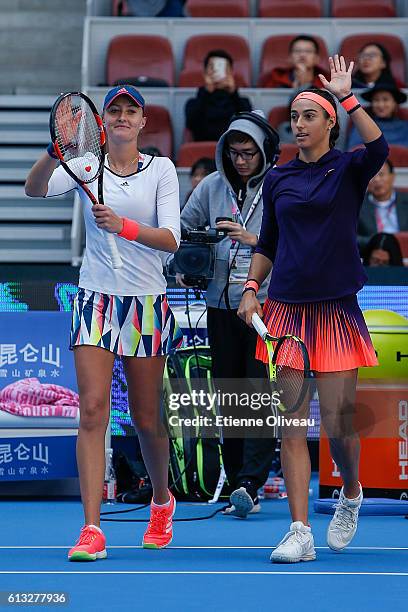 Caroline Garcia and Kristina Mladenovic of France celebrate their victory over Hao-Ching Chan and Yung-Jan Chan of Chinese Taipei during the Women's...