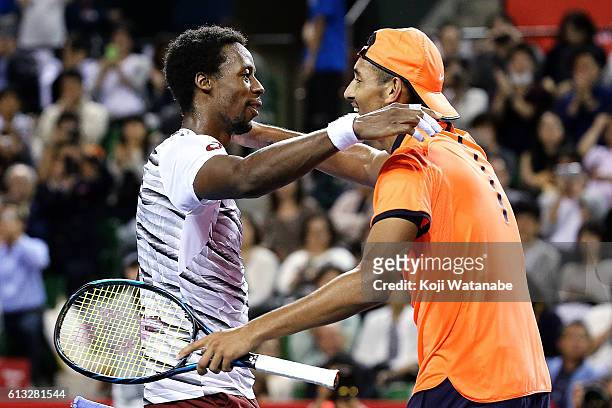 Nick Kyrgios of Australia greets Gael Monfils of France after winning the men's singles semifinal match against on day six of Rakuten Open 2016 at...