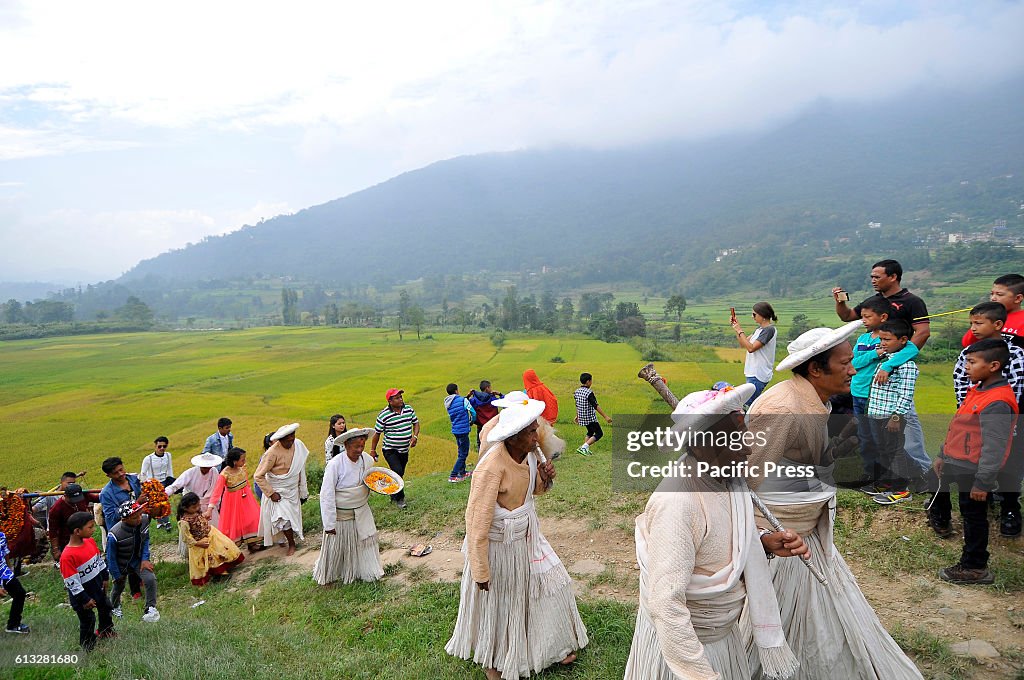 Nepalese priests going towards Shikali Temple for the...