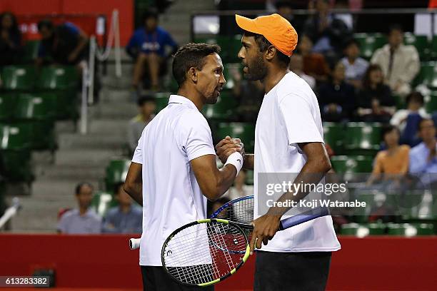 Raven Klaasen of South Africa and Rajeec Ram of United States celebrate after winning the men's doubles semifinal match against Aisam-Ul-Haq Qureshi...