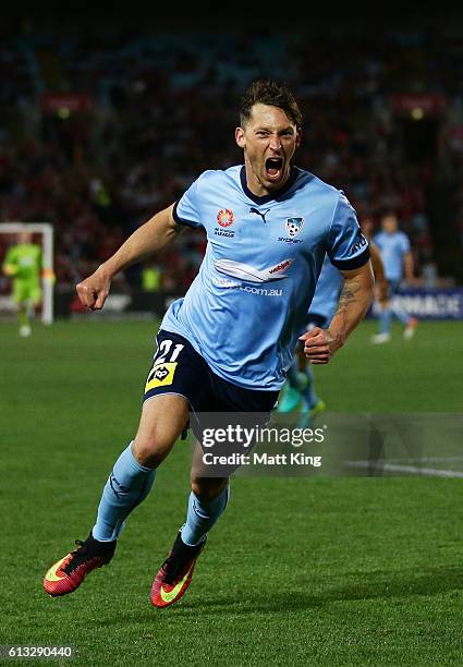 Filip Holosko of Sydney FC celebrates scoring the first goal during the round one A-League match between the Western Sydney Wanderers and Sydney FC...