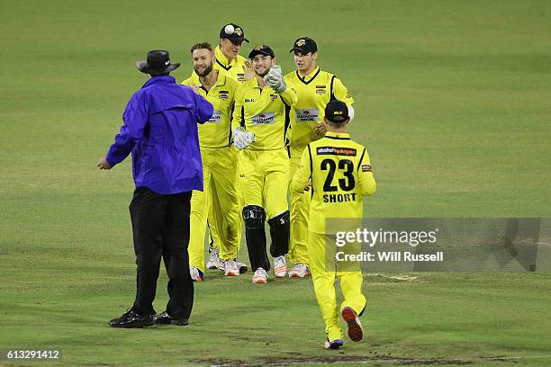 Sam Whitman of the Warriors celebrates the wicket of Dan Christian of the Bushrangers during the Matador BBQs One Day Cup match between Western...