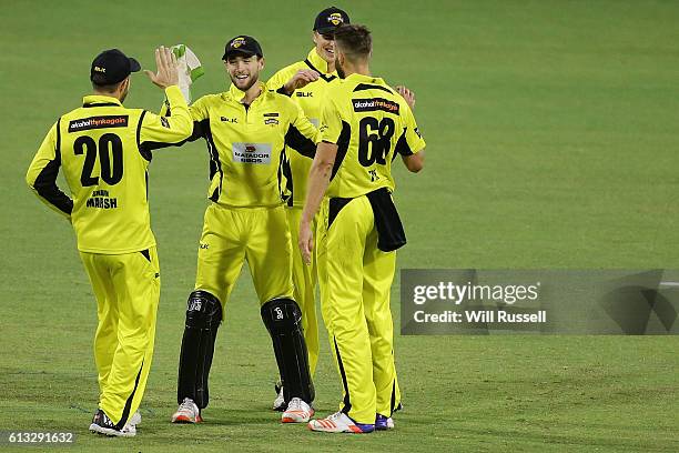 Sam Whitman of the Warriors celebrates after taking a catch off Cameron White of the Bushrangers during the Matador BBQs One Day Cup match between...