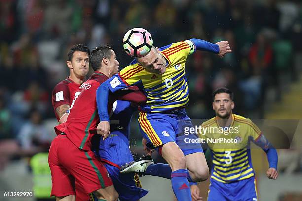 Cristiano Ronaldo of Portugal vies with IIdefons Lima of Andorra during the 2018 FIFA World Cup Qualifiers matches between Portugal and Andorra in...