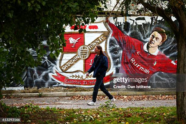 Fans arrive at the stadium for the Sky Bet League One match between Swindon Town and Bolton Wanderers at County Ground on October 8, 2016 in Swindon,...