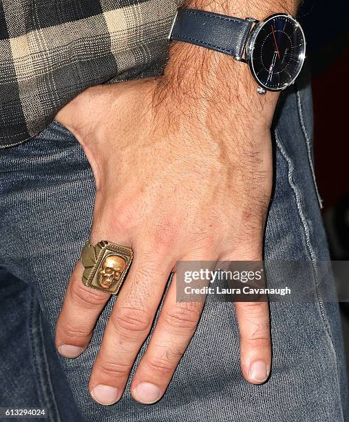 Luke Arnold, ring and watch detail, of "Black Sails" attends 2016 New York Comic Con - Day 2 on October 7, 2016 in New York City.