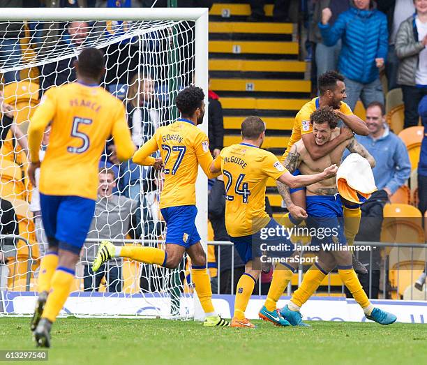 Darius Henderson of Mansfield Town celebrates his goal during the Sky Bet League Two match between Mansfield Town and Notts County at One Call...