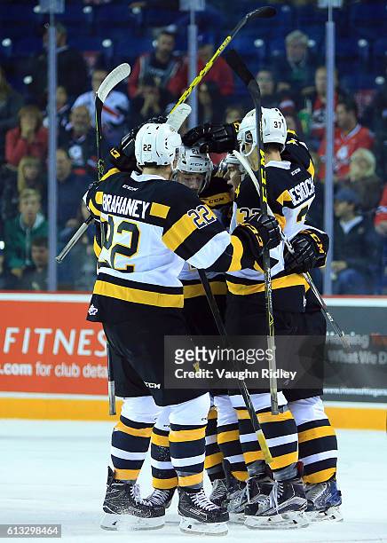 The Kingston Frontenacs celebrate a goal during an OHL game against the Niagara IceDogs at the Meridian Centre on September 30, 2016 in St...