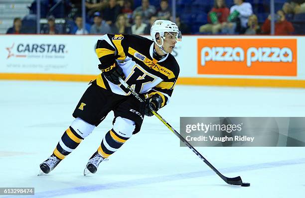 Nathan Dunkley of the Kingston Frontenacs skates with the puck during an OHL game against the Niagara IceDogs at the Meridian Centre on September 30,...