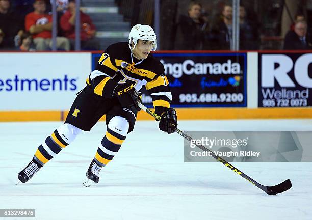 Nathan Billitier of the Kingston Frontenacs skates with the puck during an OHL game against the Niagara IceDogs at the Meridian Centre on September...