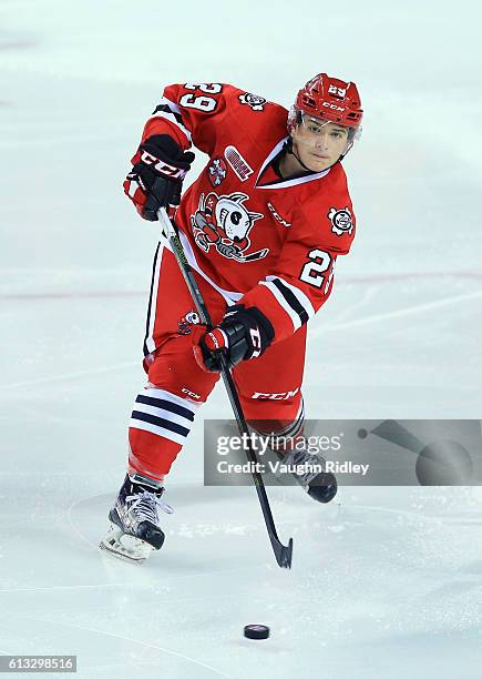 Liam Hamm of the Niagara IceDogs passes the puck during an OHL game against the Kingston Frontenacs at the Meridian Centre on September 30, 2016 in...