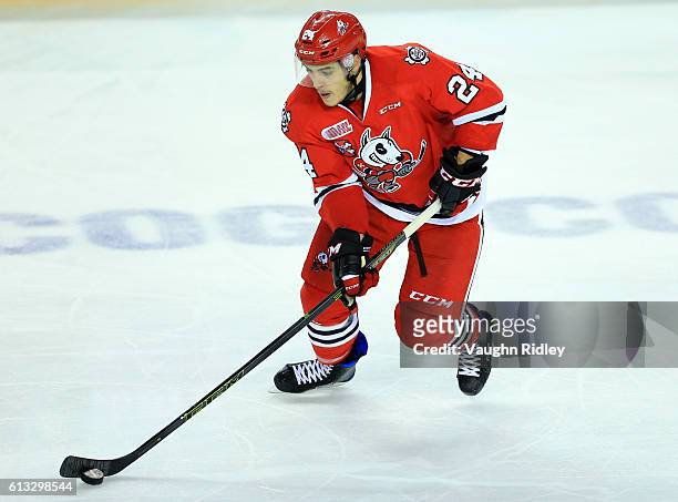 Nick Pastorious of the Niagara IceDogs skates with the puck during an OHL game against the Kingston Frontenacs at the Meridian Centre on September...