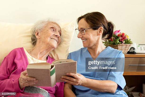 Patient Reading Reference Patient Reading Book Photos and Premium High Res Pictures - Getty Images
