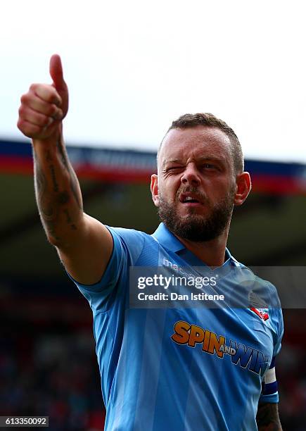 Jay Spearing of Bolton Wanderers gives a thumbs up to the fans after the Sky Bet League One match between Swindon Town and Bolton Wanderers at County...