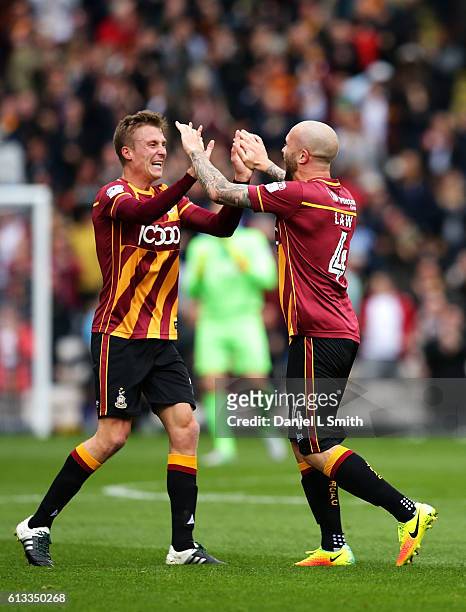 Stephen Darby of Bradford City celebrates Nicky Law's opening goal during the Sky Bet League One match between Bradford City and Shrewsbury Town at...