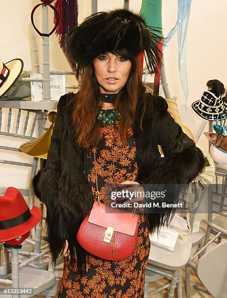 Grace Woodward attends as Stephen Jones signs copies of his book "Stephen Jones: Souvenirs" at Dover Street Market on October 8, 2016 in London,...