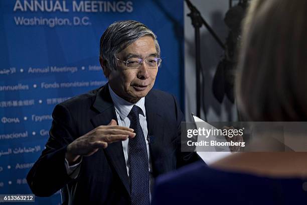 Haruhiko Kuroda, governor of the Bank of Japan , speaks during a Bloomberg Television interview at the International Monetary Fund and World Bank...