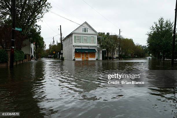 Water floods the streets on and around Broad Street in the wake of Hurricane Matthew on October 8, 2016 in Charleston, South Carolina. Across the...