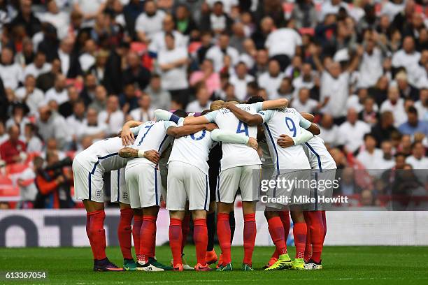 England team huddle during the FIFA 2018 World Cup Qualifier Group F match between England and Malta at Wembley Stadium on October 8, 2016 in London,...