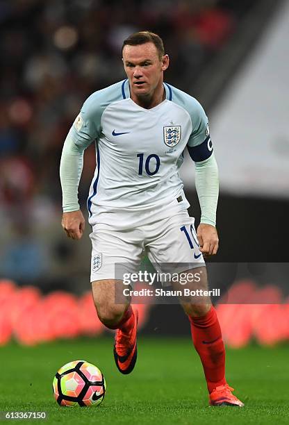 Wayne Rooney of England runs with the ball during the FIFA 2018 World Cup Qualifier Group F match between England and Malta at Wembley Stadium on...