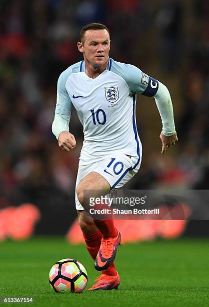 Wayne Rooney of England runs with the ball during the FIFA 2018 World Cup Qualifier Group F match between England and Malta at Wembley Stadium on...