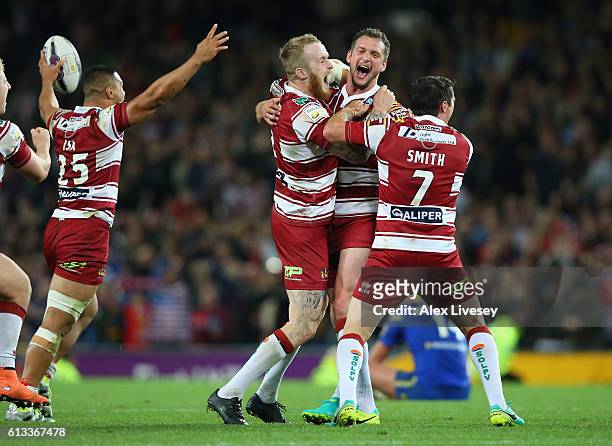 The players of Wigan Warriors celebrate victory in the First Utility Super League Final between Warrington Wolves and Wigan Warriors at Old Trafford...