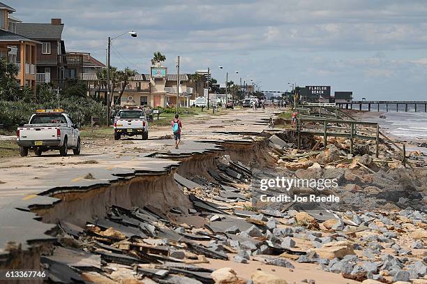 Is seen after ocean waters stirred up by Hurricane Matthew washed away part of the ocean front road on October 8, 2016 in Flagler Beach, Florida....