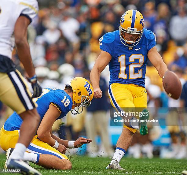 Pittsburgh Panthers place kicker Chris Blewitt kicks the point after during the first quarter during a NCAA football game between the Pittsburgh...