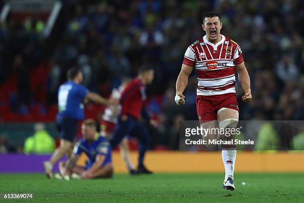 Ben Flower of Wigan runs to his supporters as he celebrates his sides 12-6 victory at the final whistle during the First Utility Super League Final...
