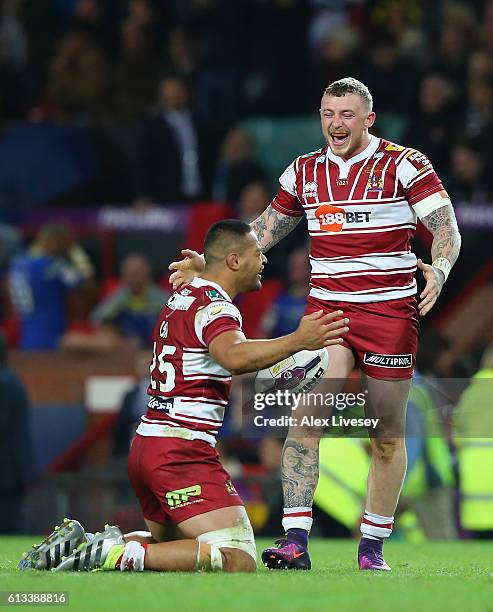 Josh Charnley and Willie Isa of Wigan Warriors celebrate victory in the First Utility Super League Final between Warrington Wolves and Wigan Warriors...