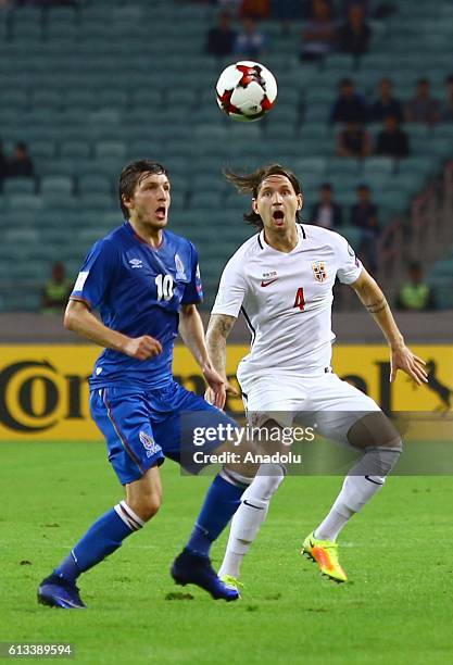 Ruslan Gurbanov of Azerbaijan in action against Stefan Strandberg of Norway during the UEFA 2018 World Cup Qualifying match between Azerbaijan and...