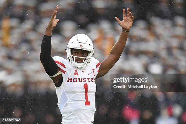Greg Ward Jr. #1 of the Houston Cougars celebrates teams first touchdown in the first period a football game against the Navy Midshipmen at...
