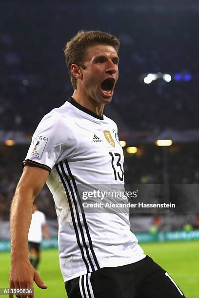 Thomas Mueller of Germany celebrates scoring the 3rd goal during the 2018 FIFA World Cup Qualifier match between Germany and Czech Republic at...