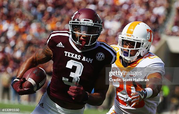 Christian Kirk of the Texas A&M Aggies runs for a 13 yard touchdown past Evan Berry of the Tennessee Volunteers in the first half of their game at...